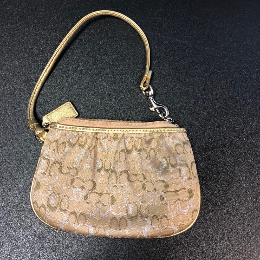 Coach wristlet gold and silver like new